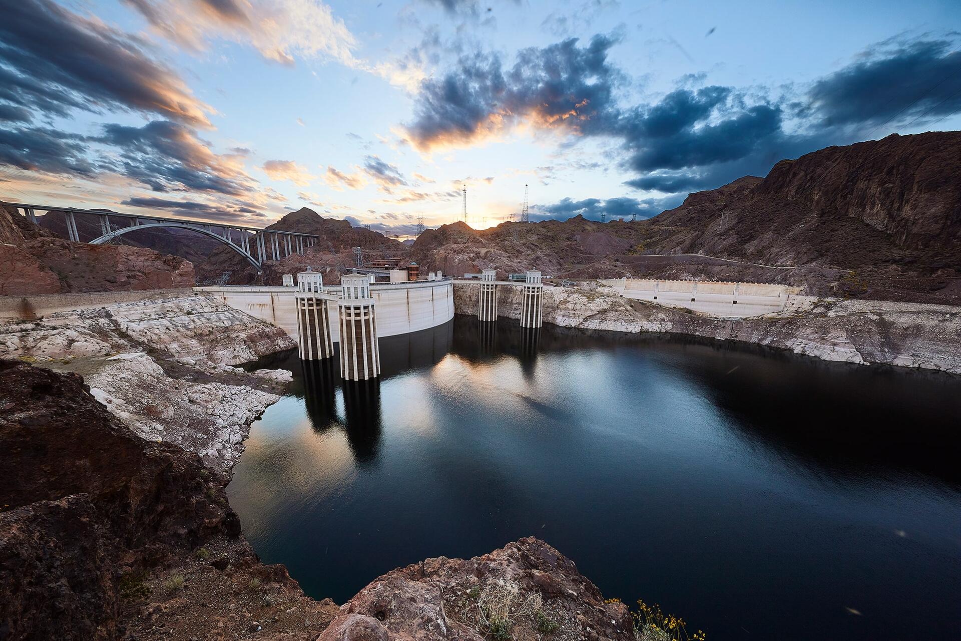 Hoover Dam and its intake towers at sunset