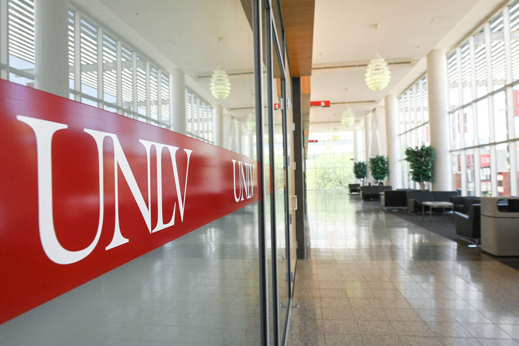 Sunlit UNLV Student Union lobby with crimson UNLV lettering
